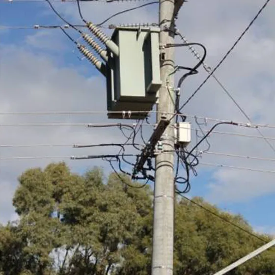 Pole-mounted oil-immersed transformer on concrete pole